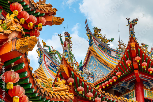 Fotografie Ornate red roofs with dragons and lanterns of a Chinese temple, Kuala Lumpur, Ma