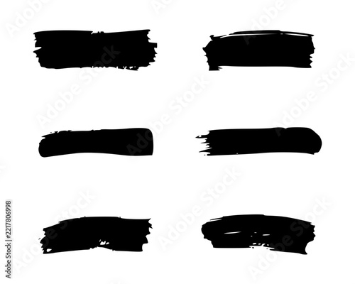 Set of short black paint brush strokes and swatches