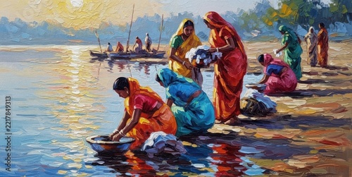 Women washing clothes by the riverside at sunset