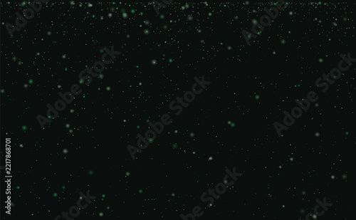 Green and white glowing particles falling from the top on a dark emerald black background