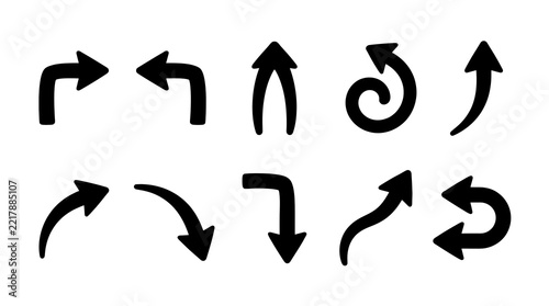 A collection of various hand drawn black arrows isolated on a white background for design and navigation elements