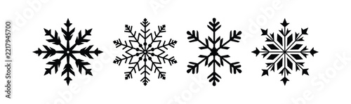 Snowflake winter symbol icon set. Snowflake vector icon set featuring intricate crystalline winter ice patterns in solid black line art.