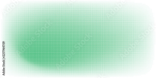 Fading polka dot background. Dotted halftone gradient texture. Repeated dots gradation pattern. green vanishing comic pop art overlay backdrop. Halftone raster effect wallpaper.