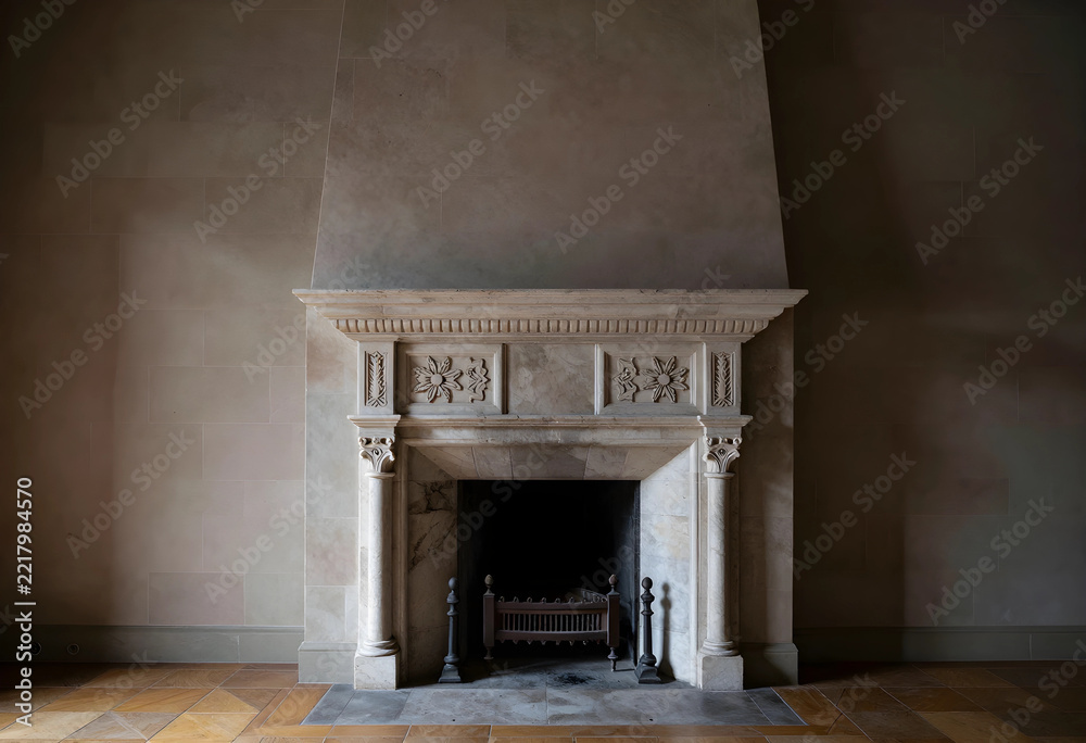 Naklejka premium Luxury interior design and home comfort, ornate marble fireplace in a classic living room with stone walls and wooden floor for architectural style