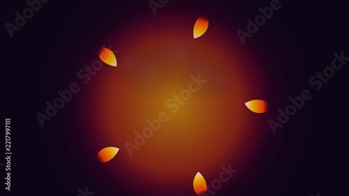 Abstract circular arrangement of glowing orange flame petals against a deep dark background.