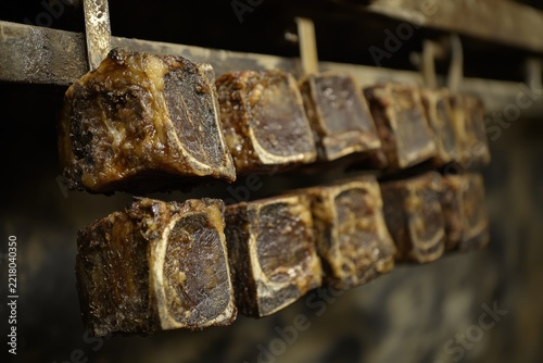 Aged Beef Steaks Hanging in a Cool Meat Storage Room