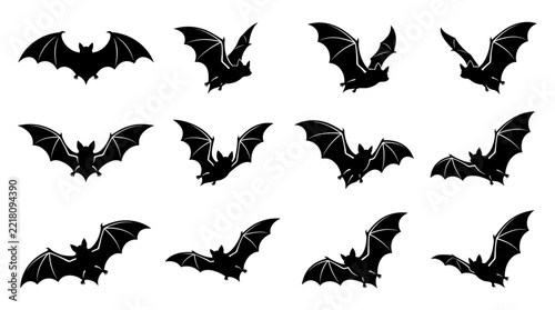 Black flying bat silhouettes collection on white background