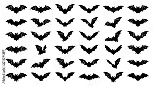Black flying bat silhouettes collection on white background