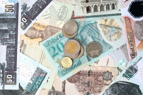 Obraz na plátně Egyptian pound money banknotes and coins on table