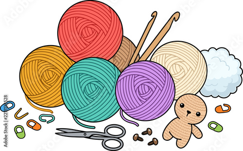Crochet supplies yarn balls, hooks, scissors, safety pins, buttons, and stuffing