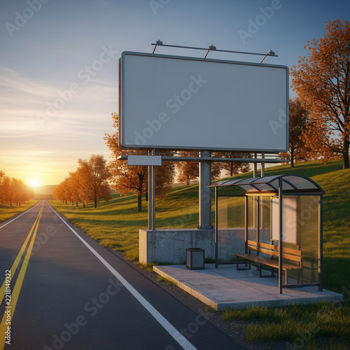 Blank billboard and bus stop on a scenic road at sunset with autumn trees