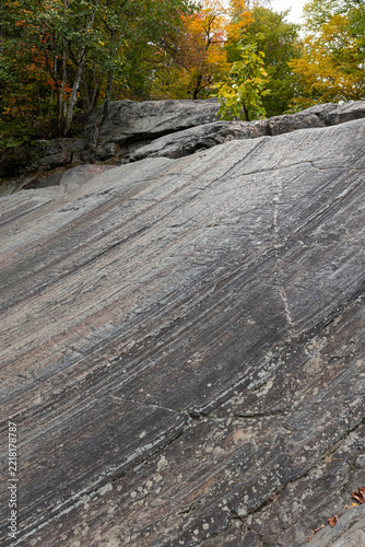 Precambrian rock in Arrowhead Park at Stubb's Falls in autumn