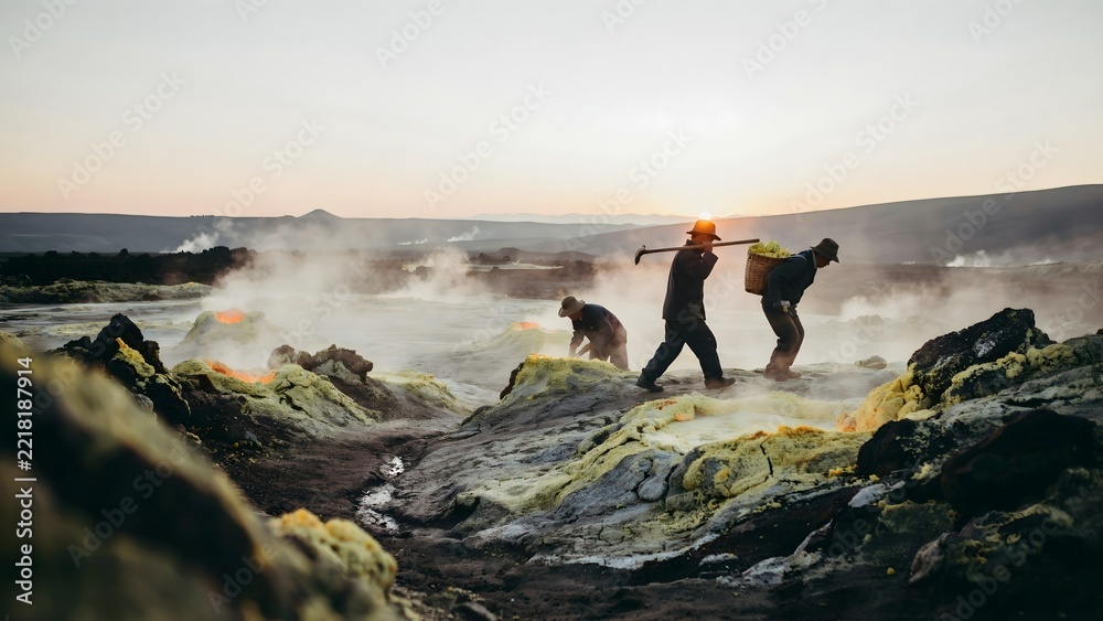 Fototapeta premium Volcanic landscape with hikers exploring bubbling hot springs at sunrise
