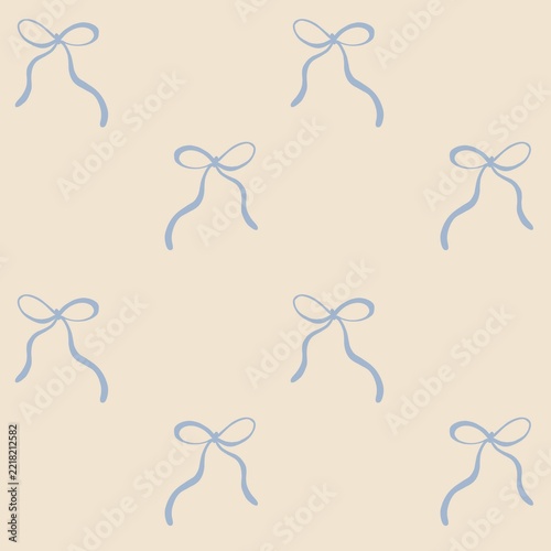 Delicate hand drawn Christmas bow pattern on a warm cream background