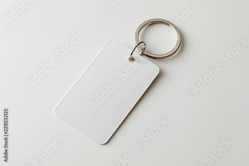 Blank Keychain with Metal Ring on White Surface