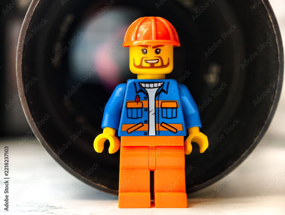 Naklejka premium Russia, St. Petersburg, August 8, 2020. Close-up of a Lego man, against the background of the lens
