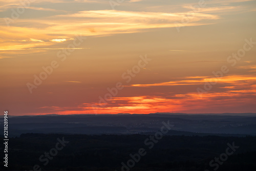 Vibrant Sunset Over Rolling Hills