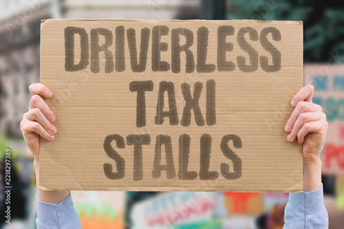 Obraz na plátně "Driverless taxi stalls" Robot cab freezes in traffic with passengers aboard