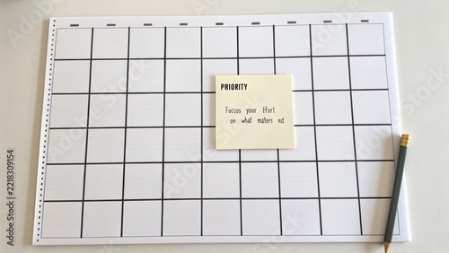 Planner Sheet with Sticky Note for Time Management and Prioritization