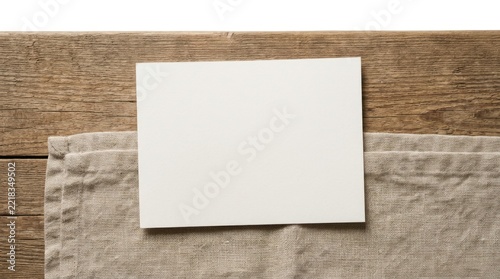 Blank horizontal card mockup on linen and wood.