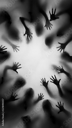 Ghostly shadow hands reaching in a circle behind white fabric, eerie Halloween vertical background