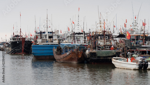 Fishing boats moored at Chinese fishing harbor