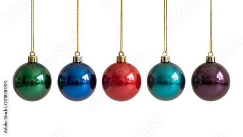 Five colorful christmas baubles hanging on string