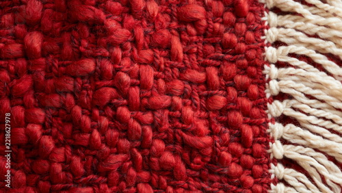 Red Wool Blanket Weave with Cream Fringe Edge Background