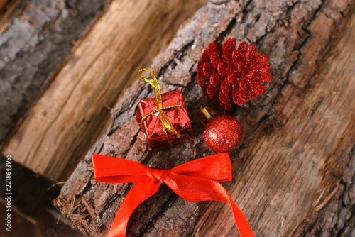 red christmas deco on firewood background  - merry christmas background - christmas card background 