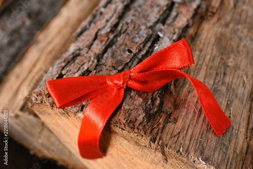 red christmas deco on firewood background  - merry christmas background - christmas card background 