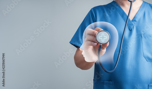 Fotografie Medical professional doctor using stethoscope with transparent head and brain symbol