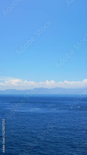 Aerial View of Mount Agung on Bali Island over Blue Ocean