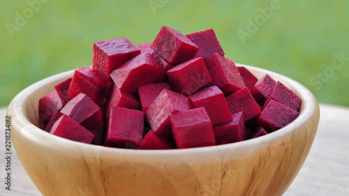 Sliced ​​beetroot in a wooden bowl
