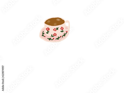 Pink floral teacup and saucer filled with brown tea, decorated with red flowers and green leaves