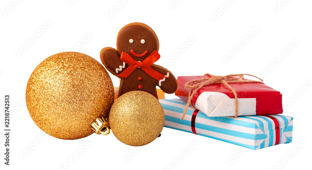 Fototapeta premium Decorations and gifts at a holiday celebration with gingerbread cookie and ornaments