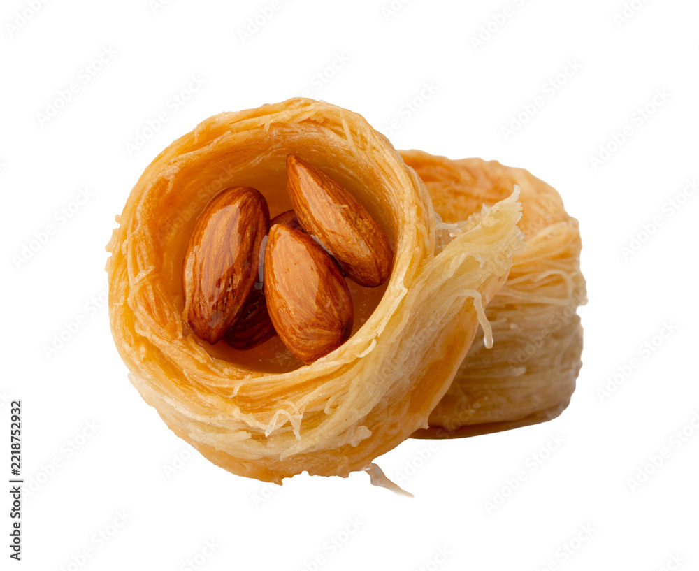Fototapeta premium Baklava dessert with almonds on a white background