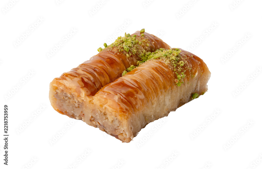 Fototapeta premium Dessert made with layers of pastry filled with nuts and sweet syrup served in a simple setting