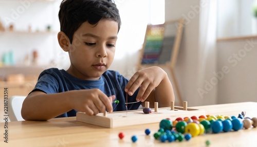 Child Practicing Fine Motor Skills with Colorful Beads