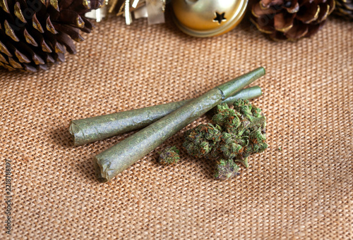 Christmas Marijuana Pre-Rolls and Cannabis Flower on Burlap