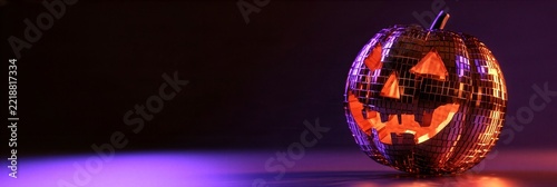 Glowing jack-o-lantern disco ball with mirror tiles and purple lighting