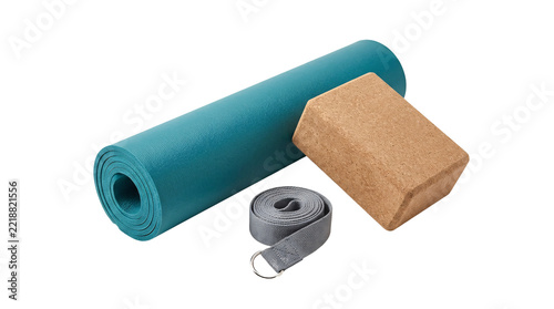 Yoga mat, cork block, and strap laid out on a clean surface, fitness equipment for exercise and stretching, healthy lifestyle accessories