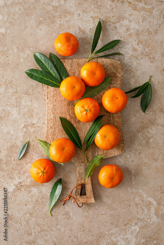 Mandarins fresh citrus fruit with green leaves