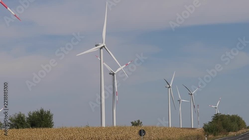 Electricity Production Turbines Wind Farm in Yellow Maize Fields Renewable Energy