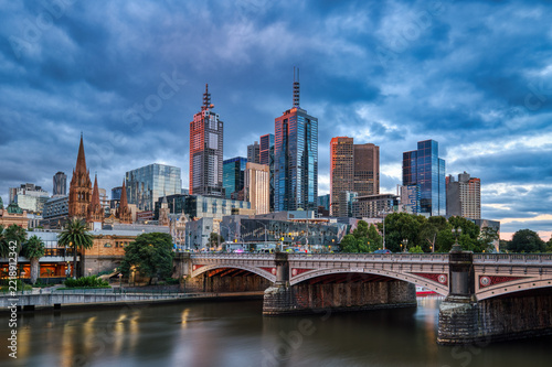 Melbourne Skyline with Princes Bridge at Dusk Illuminated by Lights Reflecting in the Yarra River