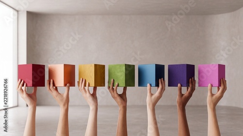 Diverse Multiracial Hands Holding Colorful Vibrant 3D Cubes in a Minimalist Studio Environment Symbolizing Unity, Strategic Collaboration, Business Growth, and Creative Commercial Innovation
