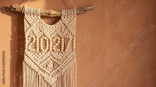 Handmade macrame wall hanging with 2027 year date for new year