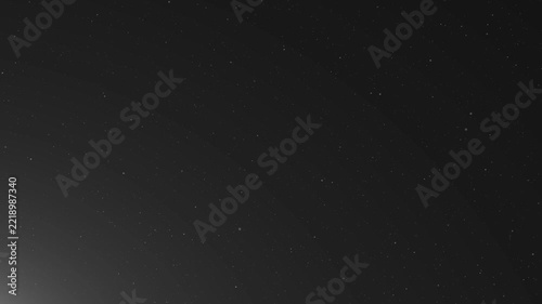 Tiny floating dust particles drift through a dark black background, creating an atmospheric organic texture for cinematic scenes, overlays, backgrounds, VFX and motion graphics