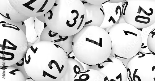 Digital animation of white bingo balls floating against transparent background