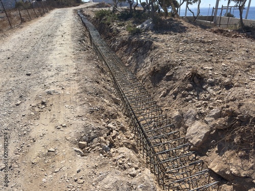 Armature anti sismique pour un mur de cloture