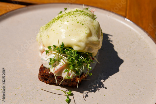 Traditional Scandinavian shrimp toast (toast Skagen) with dill, egg and mayonnaise